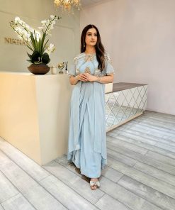 Aqua blue jacket with peach crystal handwork paired with bustier and 1side pleated skirt