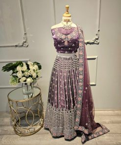 Purple glass tissue unstitched lahnga with full silver stone and peach pink thread flower