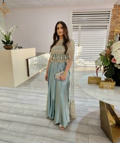 Turquoise satin drape skirt with bustier and white embroidery on the half round cape style with longer back