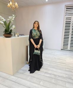 Black gorgette flared pants and cape with green swaroski detail top